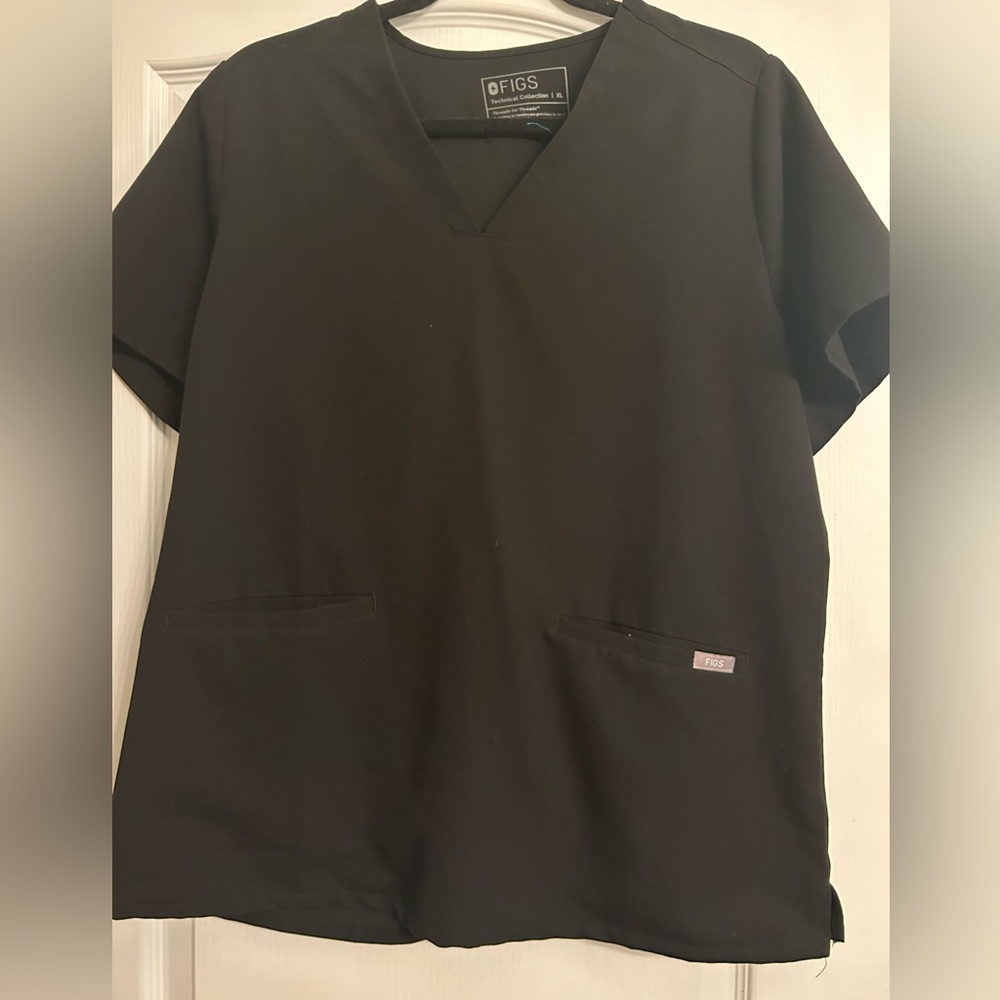 Like New women’s black x-large Casma Figs three pocket top.